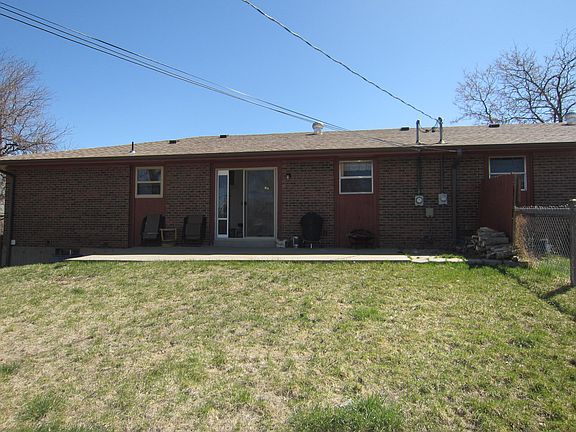 Large back yard fenced separately from other side of duplex; Open patio