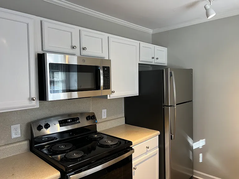 Kitchen with Stainless Steel Appliances (includes stove,refrigerator, microwave, dishwasher)