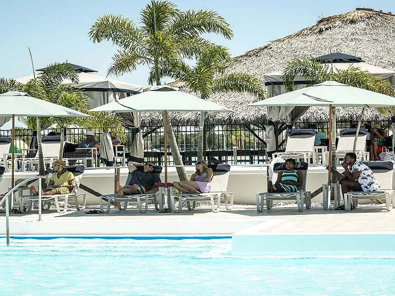 Only about 5 miles / 8 min by car to this tropical Lagoon open to public. Lagoon Hours 11-17 (bar stay open later on weekends). General Admission (prices/dates subject to change without notice) - Dec 21-April 15): ca $25 pp - other times ca $15 pp