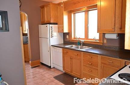 Kitchen
						:
						Amish made oak cabinets