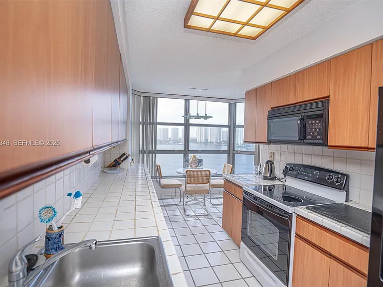 3530 Mystic Pointe Dr #1401 — Photo 14
