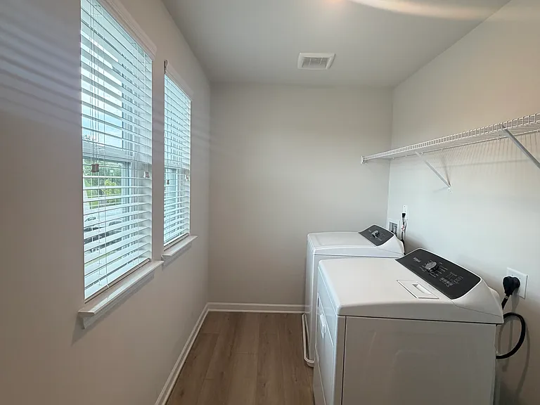 2nd floor laundry room next to 1st bedroom