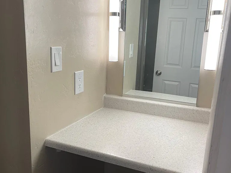 Vanity area in downstairs bathroom