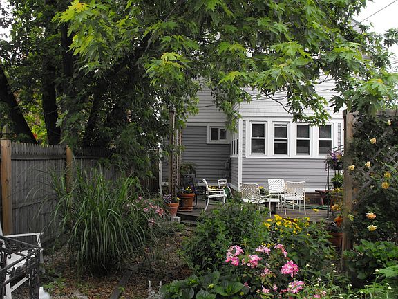 Sunroom with walk-out deck w/seating