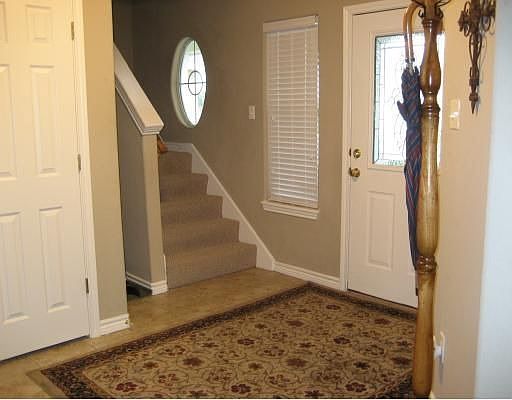 Nice open foyer with 1/2 bath.