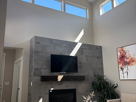 20 foot ceilings with lots of natural light. Lives big