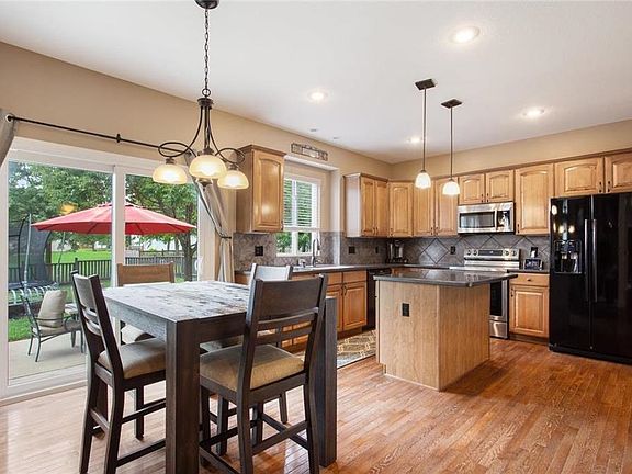 Eat in area in the kitchen , new sliding doors to outside patio