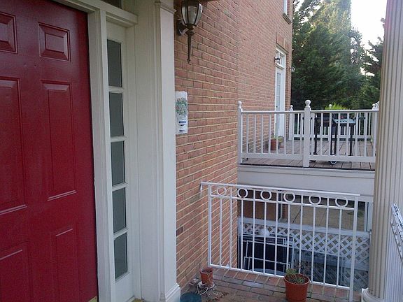 Front porch with view of balcony 1