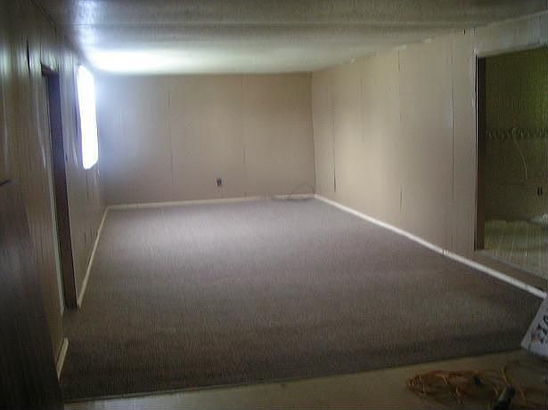 Den- addition to original mobile home.