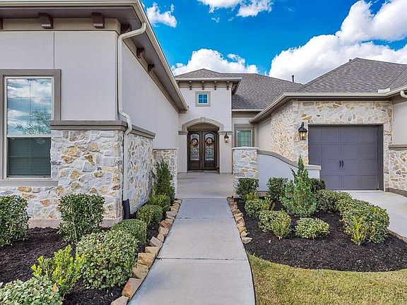 Lovely front walk and landscaping.