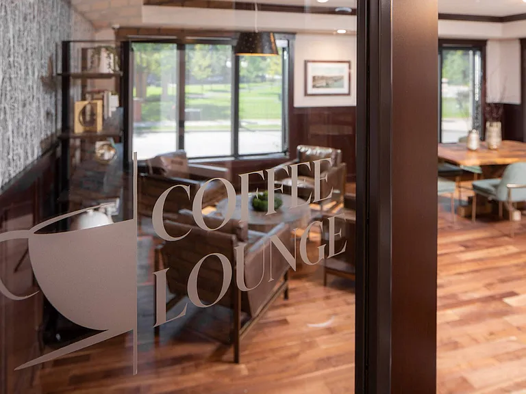 View of coffee lounge at The Whitley Apartments.
