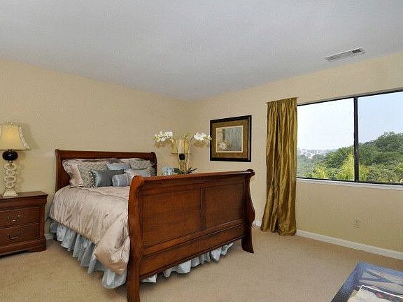 Master BR w/ 2 closets and slider to deck