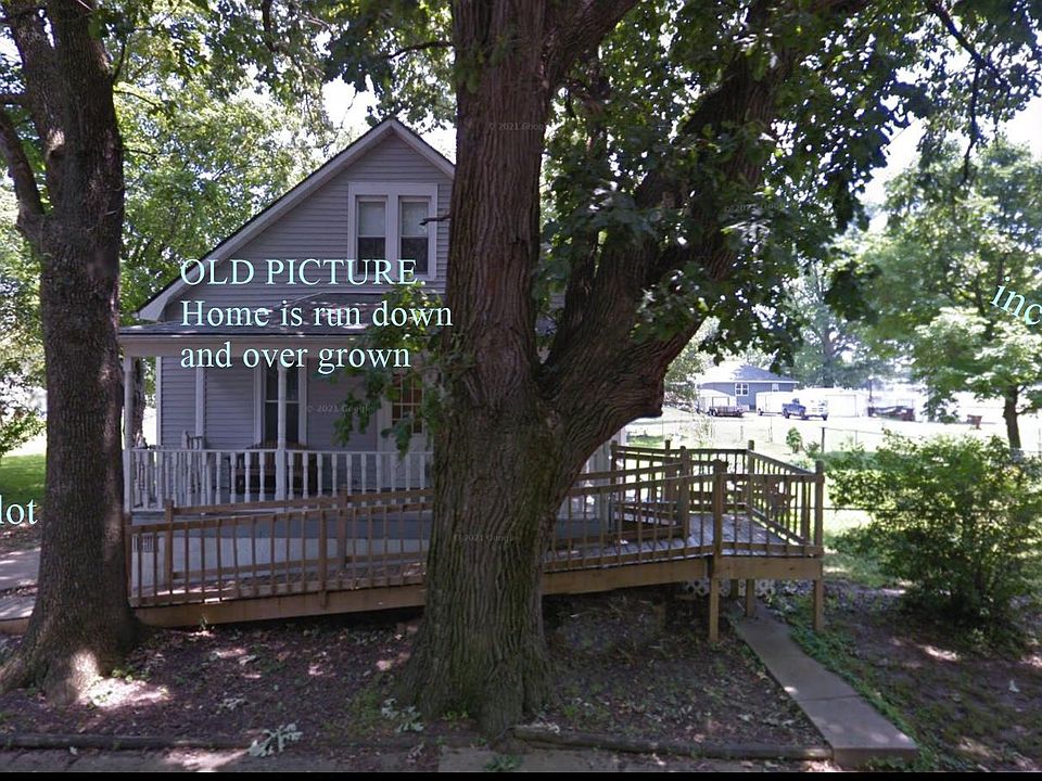 Home is a few years older than picture. Trees are bigger. Needs paint, Carpet Lino etc.