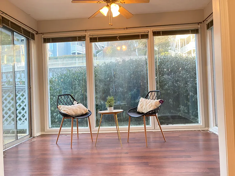 Floor-to-ceiling windows in sunroom