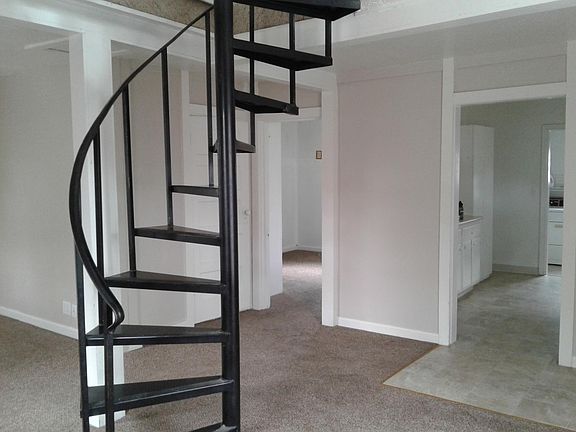 Another view of the living room toward other rooms in the house.