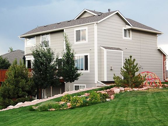 Rear home. Walk out gate to school.