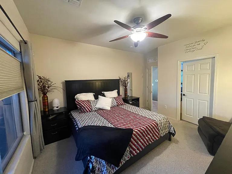 View of master bedroom. Big enough to fit a king size bed. Door to master bathroom and walk in closet to the right of entry door