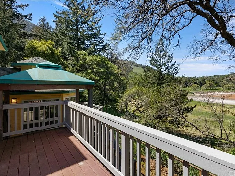 Living room Patio overlooking the expansive golf course and lake