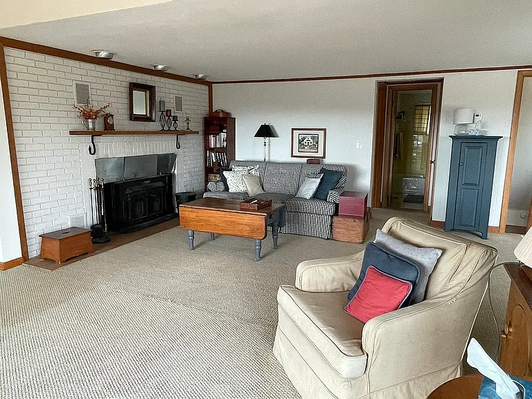 Living room with large wood stove