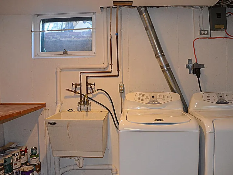 Lower Level Laundry Room with Utility Sink