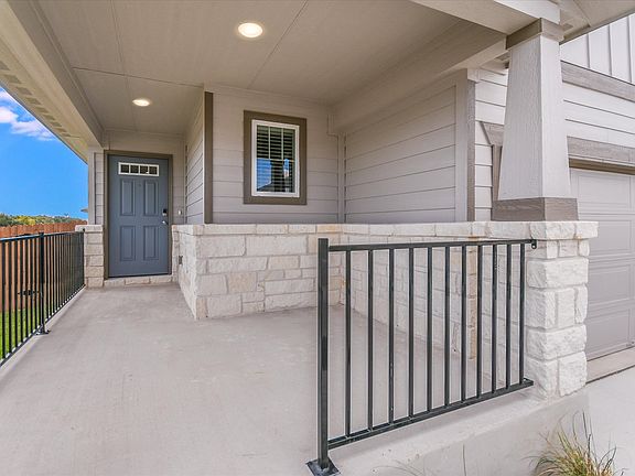 Enjoy the weather on the front porch.