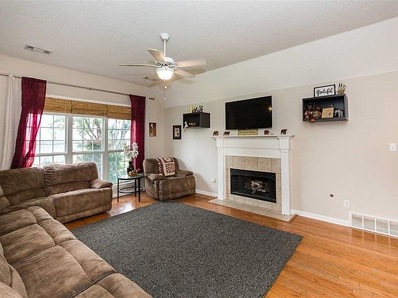 Another view of the family room and fireplace