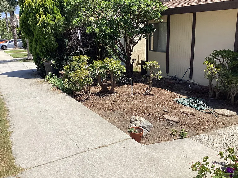 Sidewalk. One block to Vons and Starbucks. Charging station one block away.