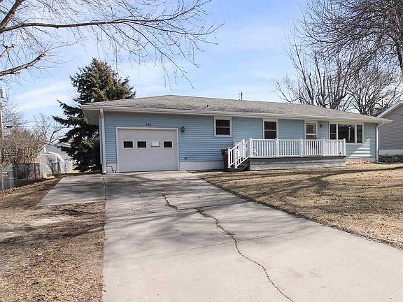 HUGE FLAT FRONT AND BACK YARD. MATURE TREE'S AND WELL MAINTAINED LAWN.