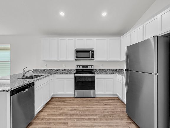 Whip up for favorite recipes in the kitchen using the included stainless-steel appliances