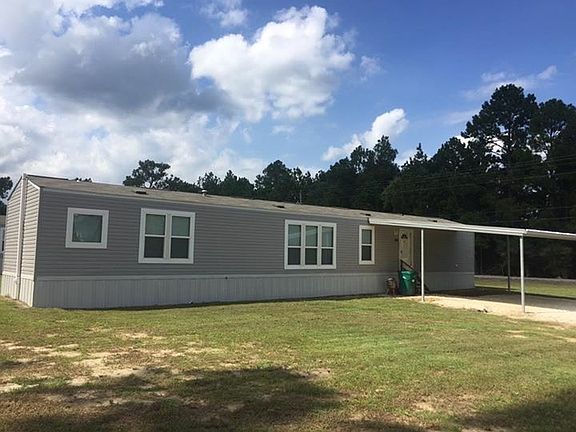 Front Yard and Covered Parking