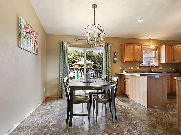 Bright and sunny dining area over looks the backyard.