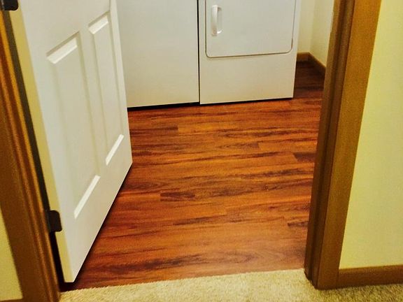 In unit laundry room with full size washer and dryer