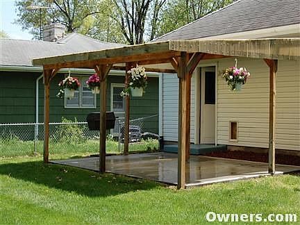 Back covered patio with gas grill