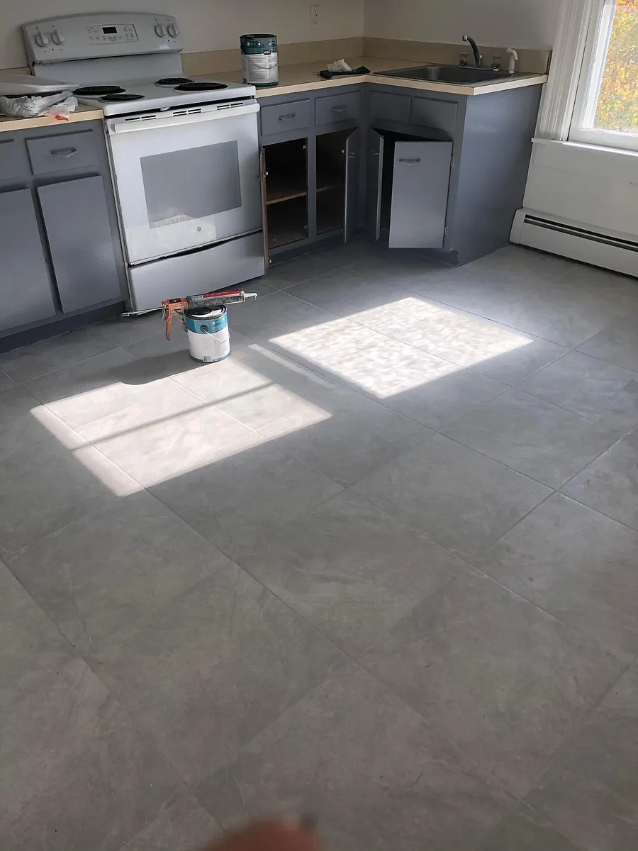 Freshly painted cabinets and brand new tile floor! - 252 Spruce St #2