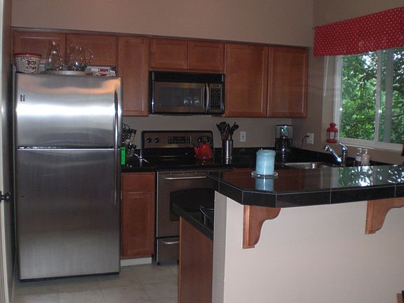 Kitchen with SS appliances and Granite counters
