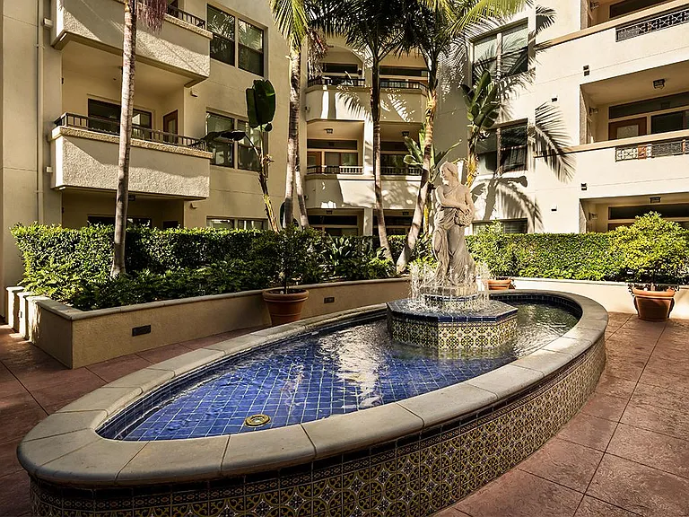 Elegant courtyard lush landscaping and fountains