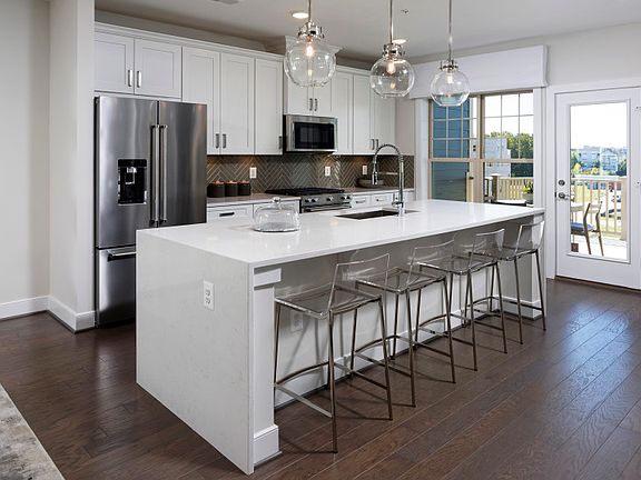 Calacatta Vicenza Quartz Countertops in the Kitchen of the Sydney New Home for Sale at Crown in Gait