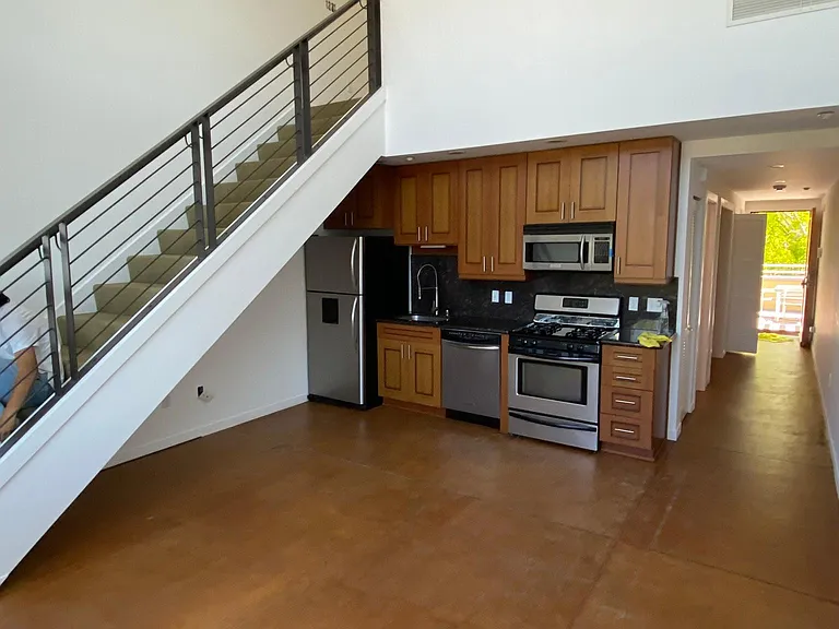 Stairs from the living room to the second floor.