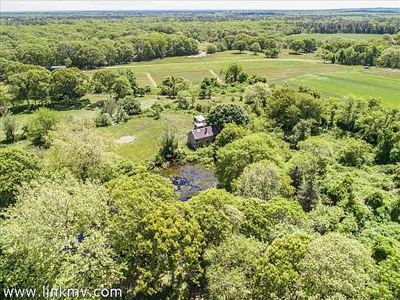Aerial view of the barn and pond. 2018