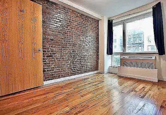2nd image of 212 E 14th St APT 4F