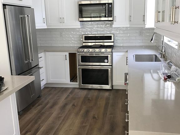 All new kitchen. There is an eating area plus a counter _island_ for eating