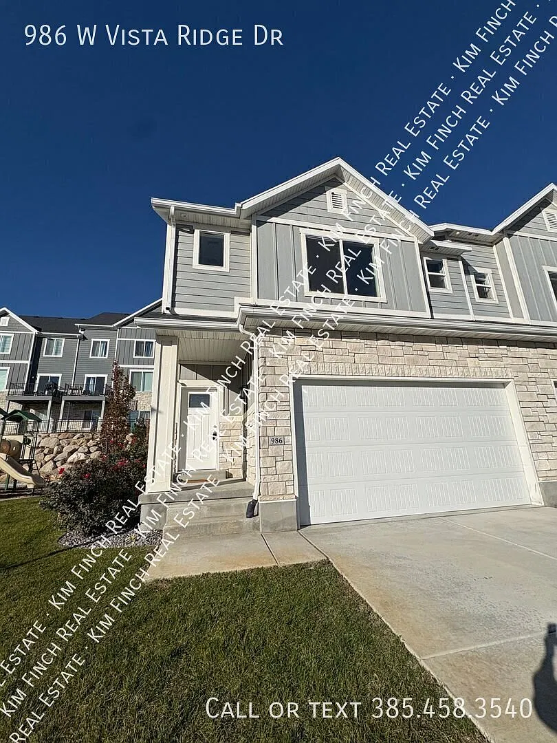 Enjoy this beautifully maintained end-unit townhome on the Lehi bench! — Photo 1