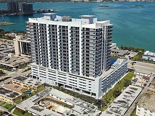 Outside of the Lexi . This corner unit is located on the opposite side building directly facing the water.