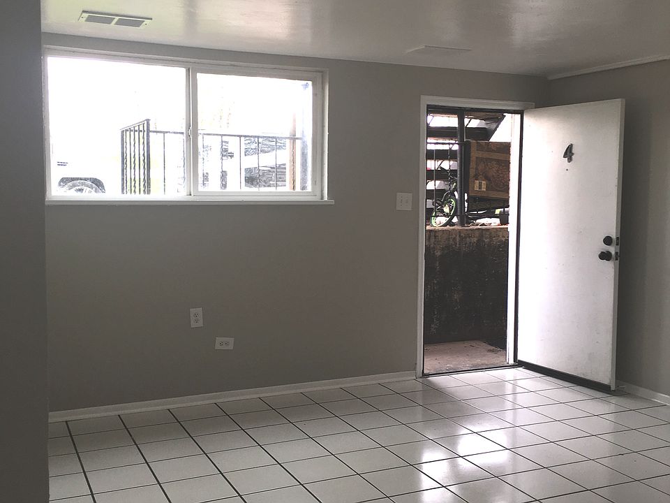 spacious living room with tile floors