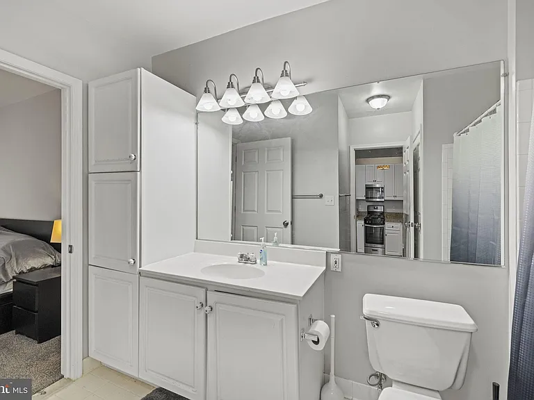 7011 Falls Reach Dr #103 — Photo 20