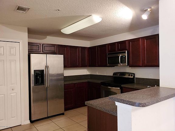 3rd image of 6925 Ortega Woods Dr Unit 4-16