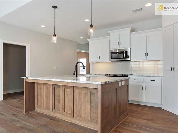 Hardwood floors throughout main floor common rooms.