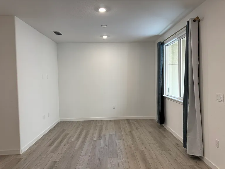 Living room with window curtains.