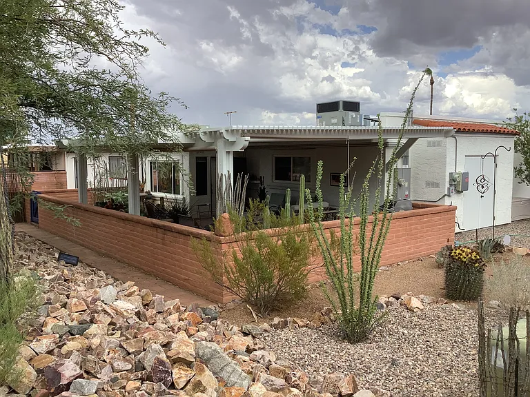 A 400 square foot, covered back porch is perfect for outdoor cooking, dining and relaxing. Includes a gas grill with a full tank.