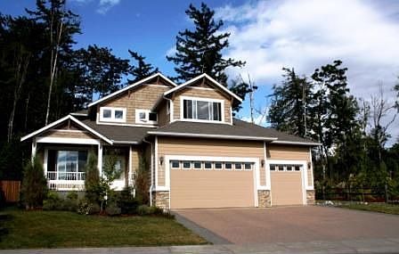 Exterior with .26 Acre lot provides privacy.